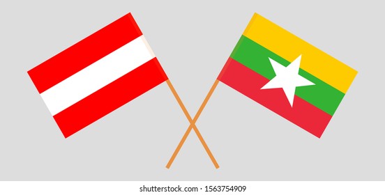 Crossed flags of Myanmar and Austria. Official colors. Correct proportion. Vector illustration
