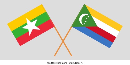 Banderas cruzadas de Myanmar y las Comoras. Colores oficiales. Proporción correcta. Ilustración del vector
