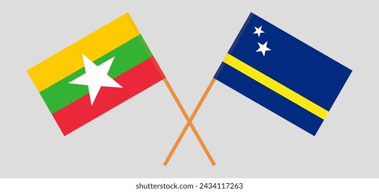 Crossed flags of Myanmar and Country of Curacao. Official colors. Correct proportion. Vector illustration
