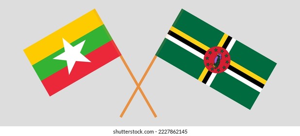 Crossed flags of Myanmar and Dominica. Official colors. Correct proportion. Vector illustration
