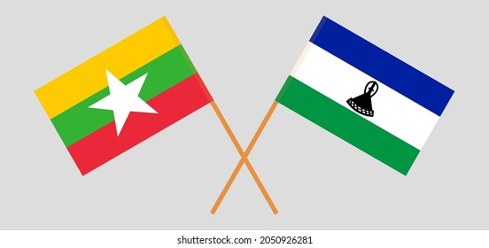 Crossed flags of Myanmar and the Kingdom of Lesotho. Official colors. Correct proportion