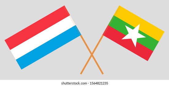 Crossed flags of Myanmar and Luxembourg. Official colors. Correct proportion. Vector illustration

