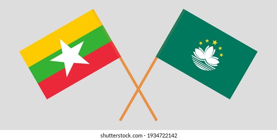Banderas cruzadas de Myanmar y Macao. Colores oficiales. Proporción correcta