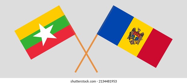 Crossed flags of Myanmar and Moldova. Official colors. Correct proportion. Vector illustration

