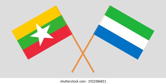 Crossed flags of Myanmar and Sierra Leone