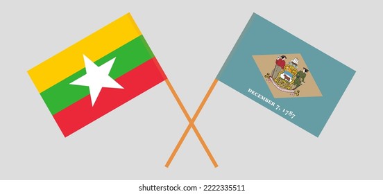 Crossed flags of Myanmar and The State of Delaware. Official colors. Correct proportion. Vector illustration

