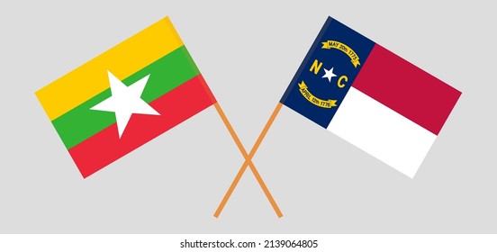 Crossed flags of Myanmar and The State of North Carolina. Official colors. Correct proportion. Vector illustration
