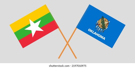 Banderas cruzadas de Myanmar y el estado de Oklahoma. Colores oficiales. Proporción correcta. Ilustración del vector
