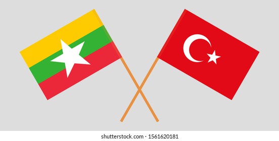 Crossed flags of Myanmar and Turkey. Official colors. Correct proportion. Vector illustration
