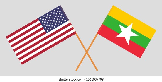 Crossed flags of Myanmar and the USA