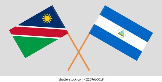 Gekreuzte Flaggen von Namibia und Nicaragua. Offizielle Farben. Richtiger Anteil. Vektorgrafik
