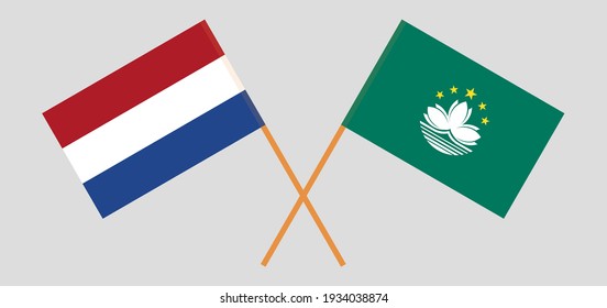 Banderas cruzadas de los Países Bajos y Macao. Colores oficiales. Proporción correcta