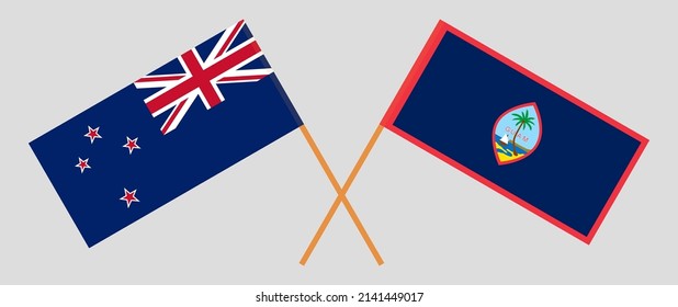 Crossed flags of New Zealand and Guam. Official colors. Correct proportion. Vector illustration
