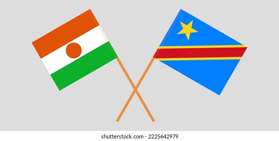 Crossed flags of Niger and Democratic Republic of the Congo. Official colors. Correct proportion. Vector illustration
