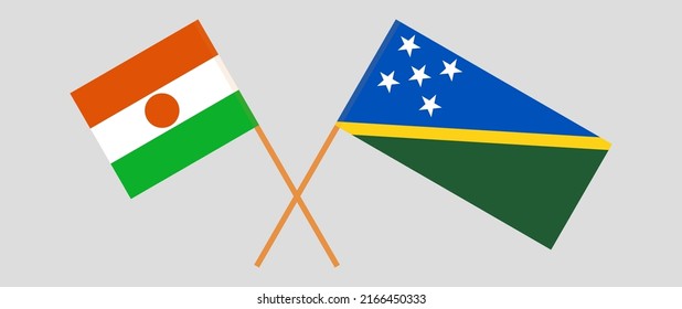 Crossed flags of Niger and Solomon Islands. Official colors. Correct proportion. Vector illustration

