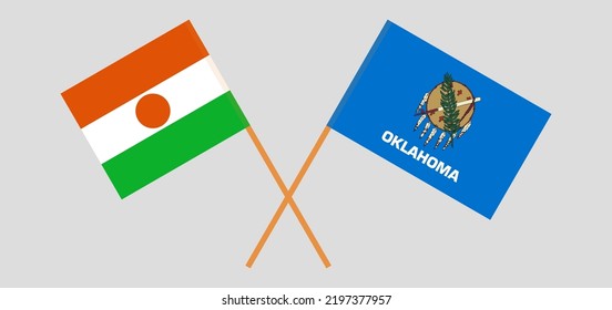 Crossed flags of Niger and The State of Oklahoma. Official colors. Correct proportion. Vector illustration

