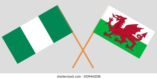 Crossed flags of Nigeria and Wales. Official colors. Correct proportion