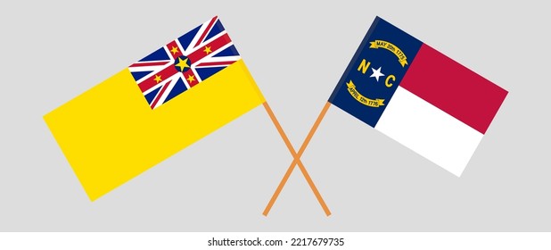 Crossed flags of Niue and The State of North Carolina. Official colors. Correct proportion. Vector illustration
