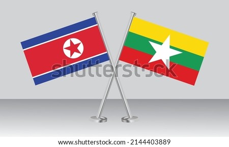 Crossed flags of North Korea and Myanmar. Official colors. Correct proportion. Banner design