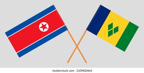 Crossed flags of North Korea and Saint Vincent and the Grenadines. Official colors. Correct proportion. Vector illustration
