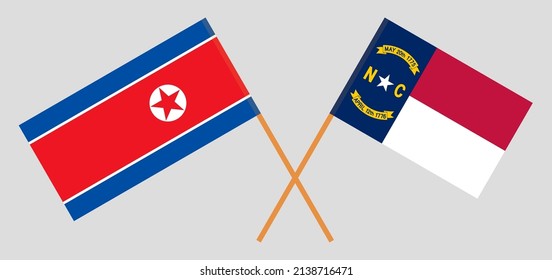 Crossed flags of North Korea and The State of North Carolina. Official colors. Correct proportion. Vector illustration
