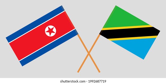 Crossed flags of North Korea and Tanzania. Official colors. Correct proportion