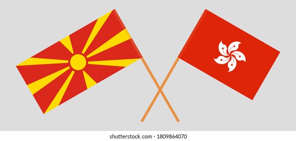 Crossed flags of North Macedonia and Hong Kong. Official colors. Correct proportion. Vector illustration
