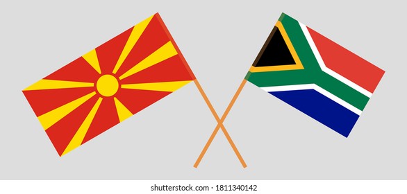 Crossed flags of North Macedonia and Republic of South Africa. Official colors. Correct proportion. Vector illustration
