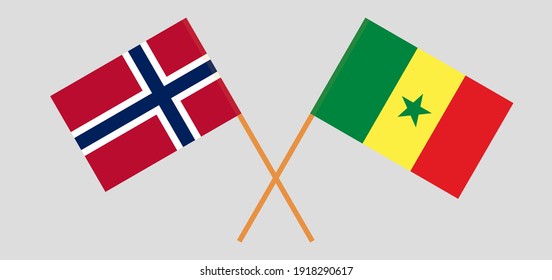 Banderas cruzadas de Noruega y Senegal