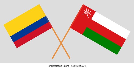 Crossed flags of Oman and Colombia. Official colors. Correct proportion. Vector illustration
