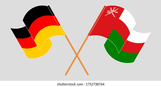 Crossed flags of Oman and Germany