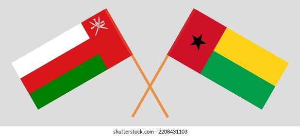 Crossed flags of Oman and Guinea-Bissau. Official colors. Correct proportion. Vector illustration
