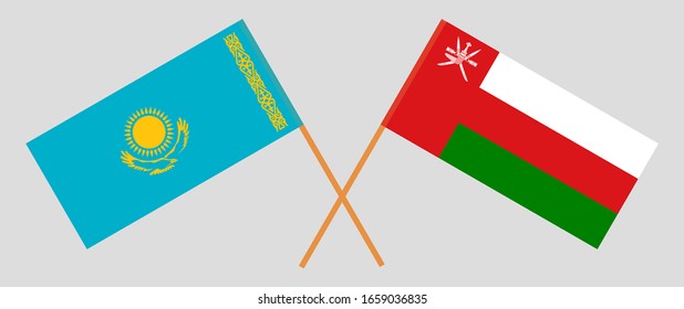 Crossed flags of Oman and Kazakhstan. Official colors. Correct proportion. Vector illustration
