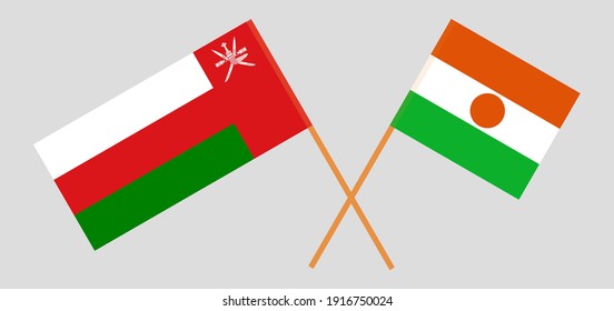 Crossed flags of Oman and the Niger
