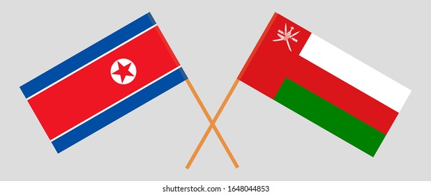 Crossed flags of Oman and North Korea. Official colors. Correct proportion. Vector illustration
