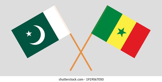 Crossed flags of Pakistan and Senegal