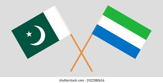 Crossed flags of Pakistan and Sierra Leone. Official colors. Correct proportion