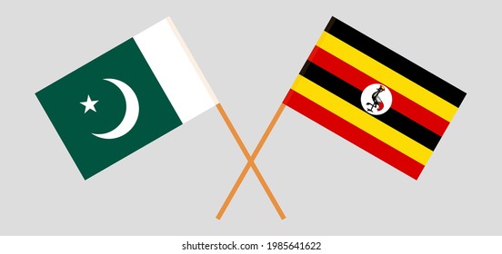 Gekreuzte Flaggen von Pakistan und Uganda. Offizielle Farben. Richtiger Anteil