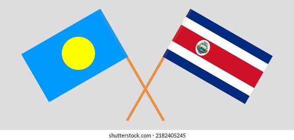 Crossed flags of Palau and Costa Rica. Official colors. Correct proportion. Vector illustration
