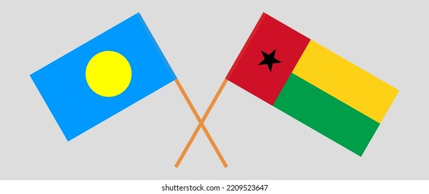 Crossed flags of Palau and Guinea-Bissau. Official colors. Correct proportion. Vector illustration
