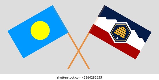 Crossed flags of Palau and The State of Utah. Official colors. Correct proportion. Vector illustration

