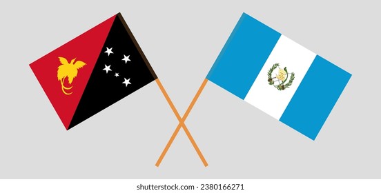 Crossed flags of Papua New Guinea and Guatemala. Official colors. Correct proportion. Vector illustration
