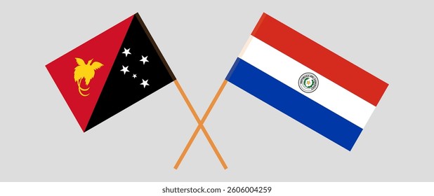 Crossed flags of Papua New Guinea and Republic of Paraguay. Official colors. Correct proportion. Vector illustration.
