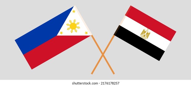 Gekreuzte Flaggen der Philippinen und Ägyptens. Offizielle Farben. Richtiger Anteil. Vektorgrafik
