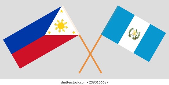 Crossed flags of the Philippines and Guatemala. Official colors. Correct proportion. Vector illustration
