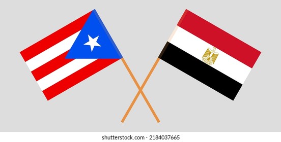 Crossed flags of Puerto Rico and Egypt. Official colors. Correct proportion. Vector illustration
