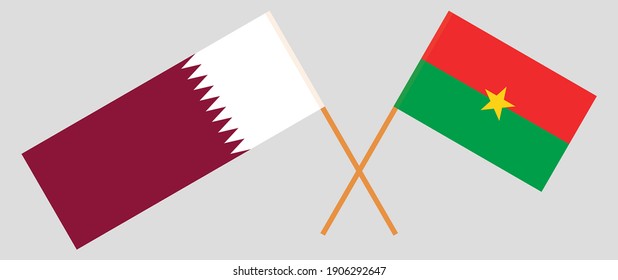 Crossed flags of Qatar and Burkina Faso