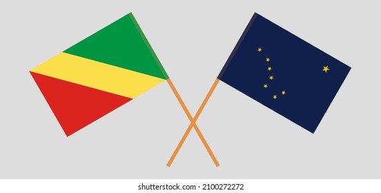 Crossed flags of Republic of the Congo and the State of Alaska. Official colors. Correct proportion. Vector illustration
