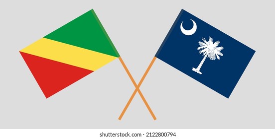Crossed flags of Republic of the Congo and The State of South Carolina. Official colors. Correct proportion. Vector illustration
