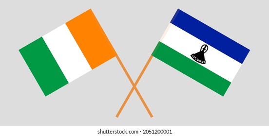 Crossed flags of Republic of Ivory Coast and Kingdom of Lesotho. Official colors. Correct proportion